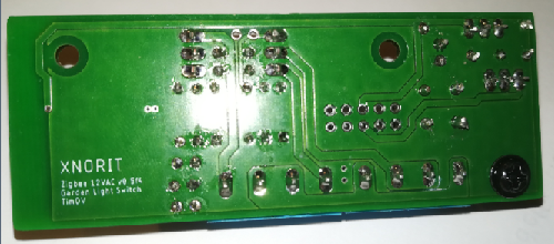 PCB bottomside with soldered components.